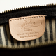 Image for article titled A Sturdy Black Clutch That Holds Almost Anything